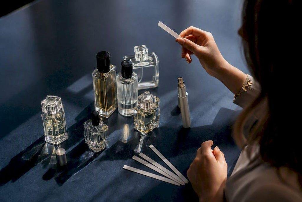 Perfume samples being tested before a small wholesale order