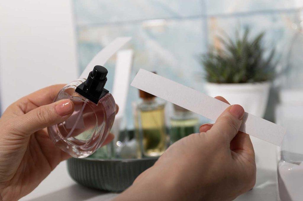 Testing perfume with paper scent strips before buying